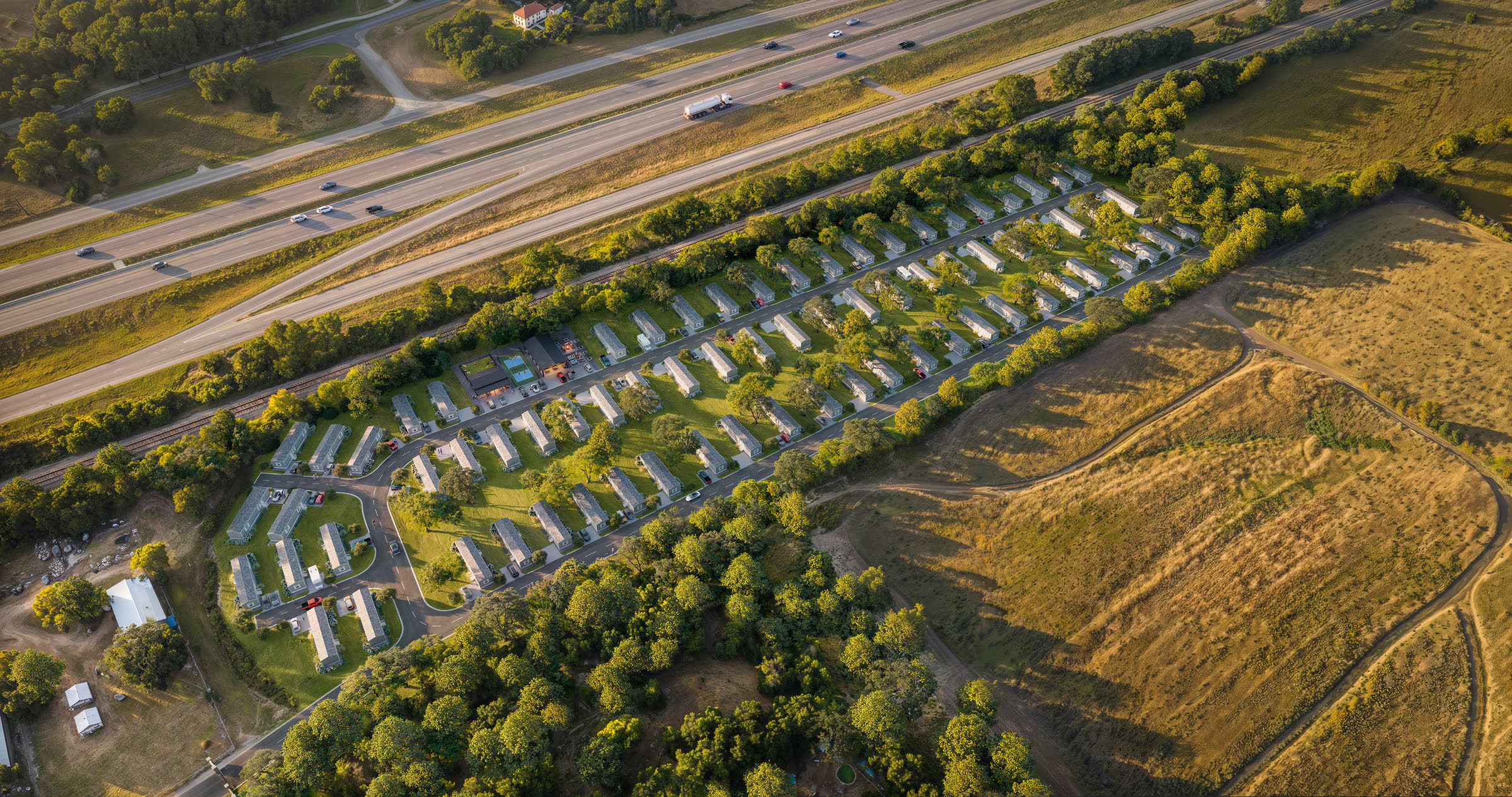 Aerial rendering of Villages at Nolanville showing the homesites and the amenity village